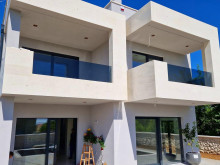 Modern villa with pool under construction 300 m from the sea in Privlaka