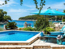 Charming villa with pool first row to the sea on the island of Korcula