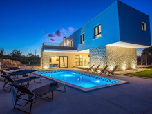 A beautiful modern villa with a swimming pool in the vicinity of Split