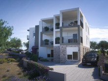 Apartment in a new building 150 m from the sea in Žaborić