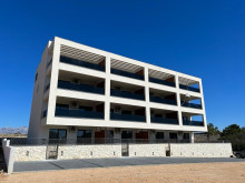 Modern apartment in a new building 250 m from the beach on the island of Pag