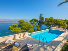 Luxury villa in an exclusive location, first row by the sea in Splitska on the island of Brač