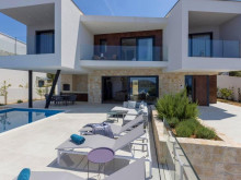 A modern luxury villa with a beautiful view of the sea near Rogoznica