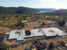 Land with family farm under construction with a panoramic view over Rogoznica