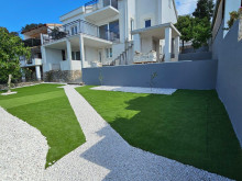 New luxury villa with three apartments next to the beach near Trogir